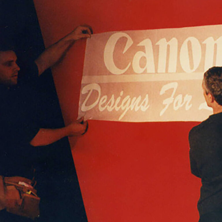 installing the set for Canon Designs for Life AIDS Red Ribbon catwalk show