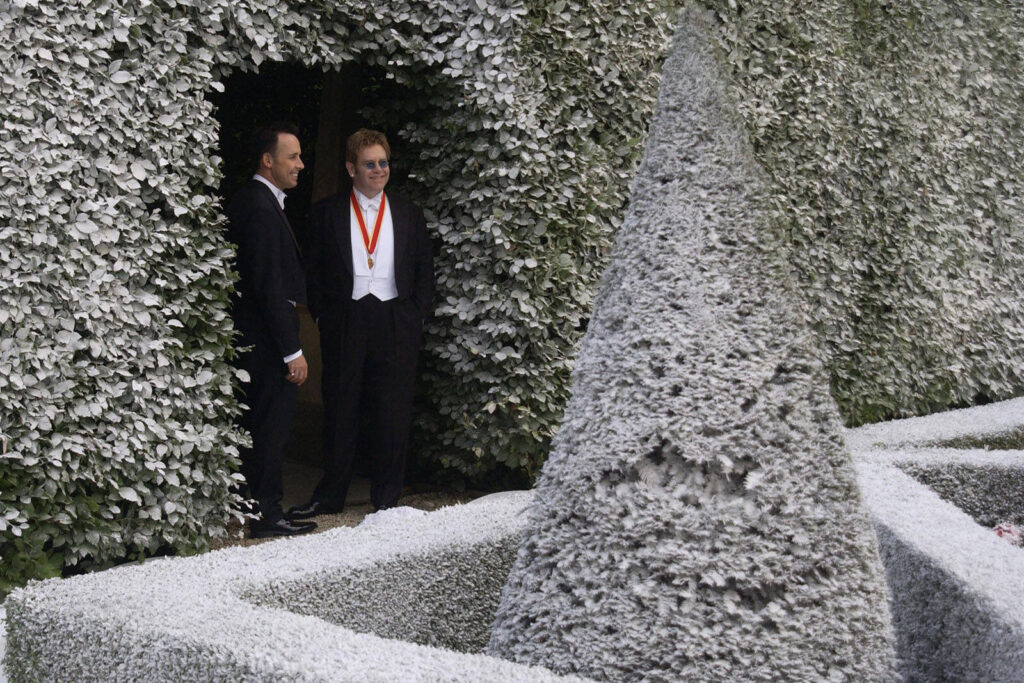 David Furnish and Sir Elton John at Sir Elton John's White Tie and Tiara Ball