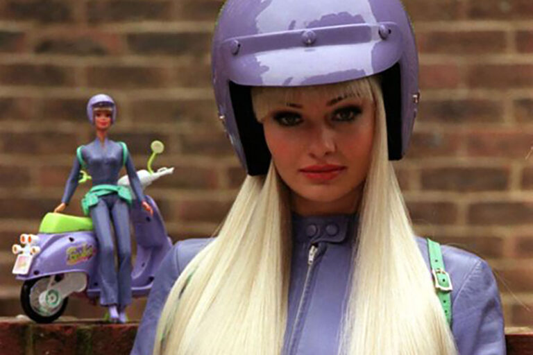 model dressed as biker Barbie for The Art of Barbie for Mattel