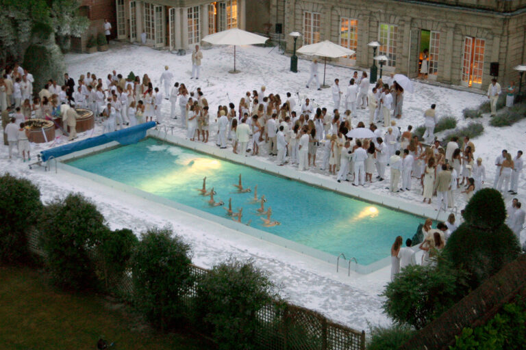 Fake snow covered pool party for The White Party at Cliveden