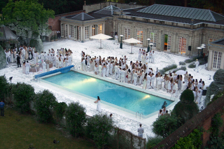 Fake snow covered pool party for The White Party at Cliveden